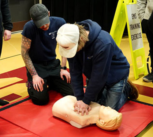 Student at Mid-State Technical Colleges' Program Showcase practicing CPR.