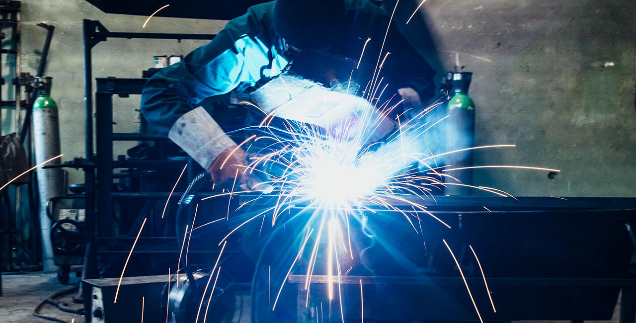 Ironworker Welding, Sparks Flying