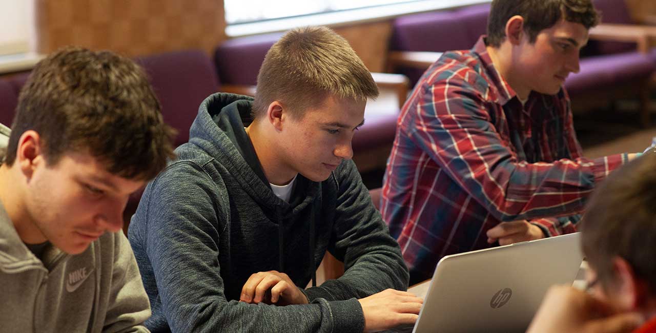 Young men in classroom setting