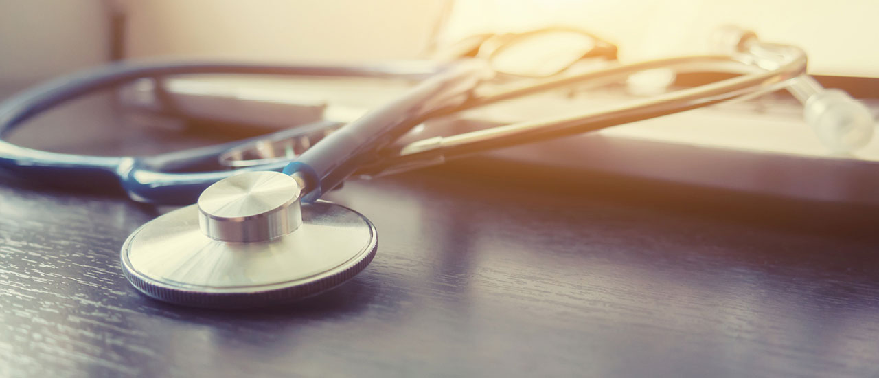 Stethoscope laying on table