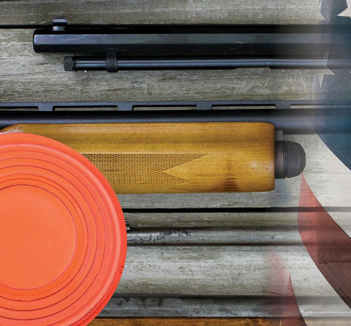 shotguns and clay pigeons laying on a table
