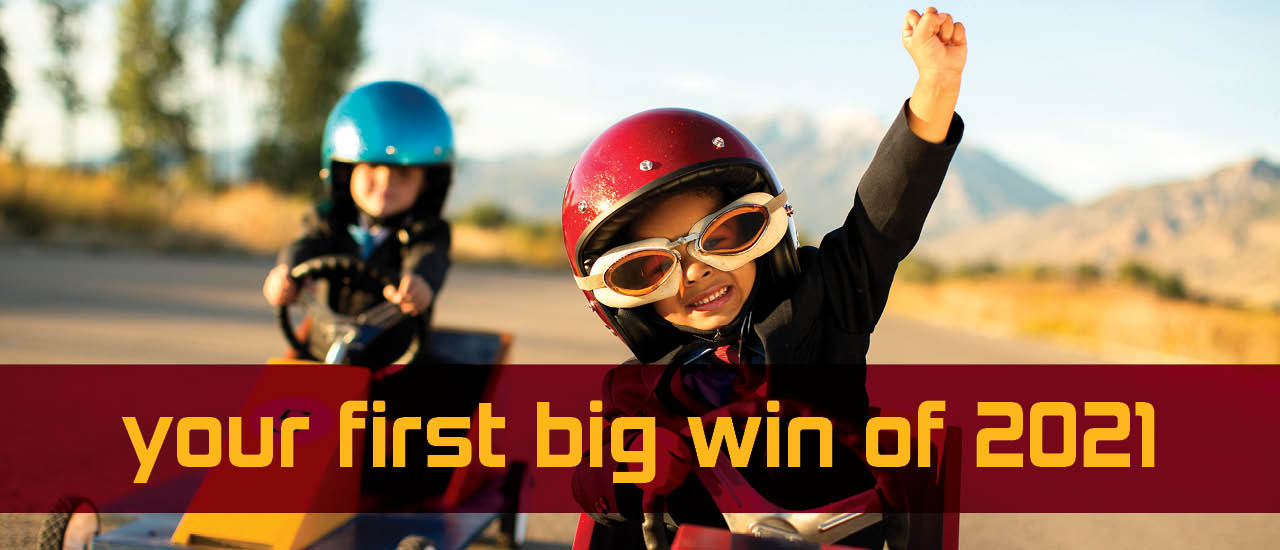 2 kids riding on gocarts, "Your first big win of 2021"