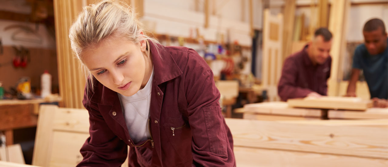 Woman drawing on a schematic