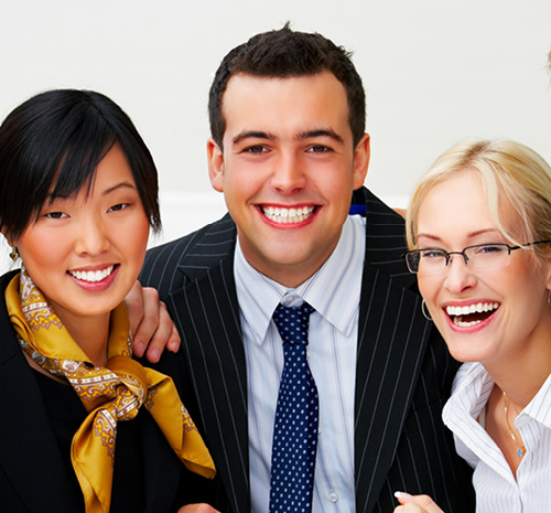 3 people dressed in business attire