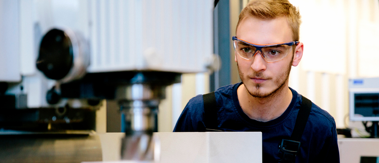 Student studies machine mechanics.