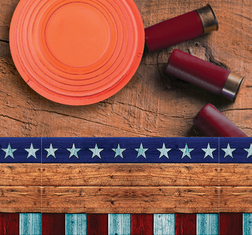Clay pigeons and shotgun shells laying on a table with an American flag themed border at the bottom