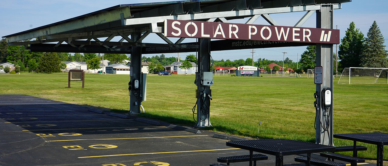 Mid-State Technical College's electric vehicle charging station powered by solar energy on the Wisconsin Rapids Campus.