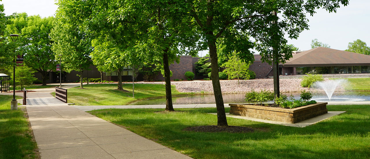 Wisconsin Rapids campus walking path and pond.