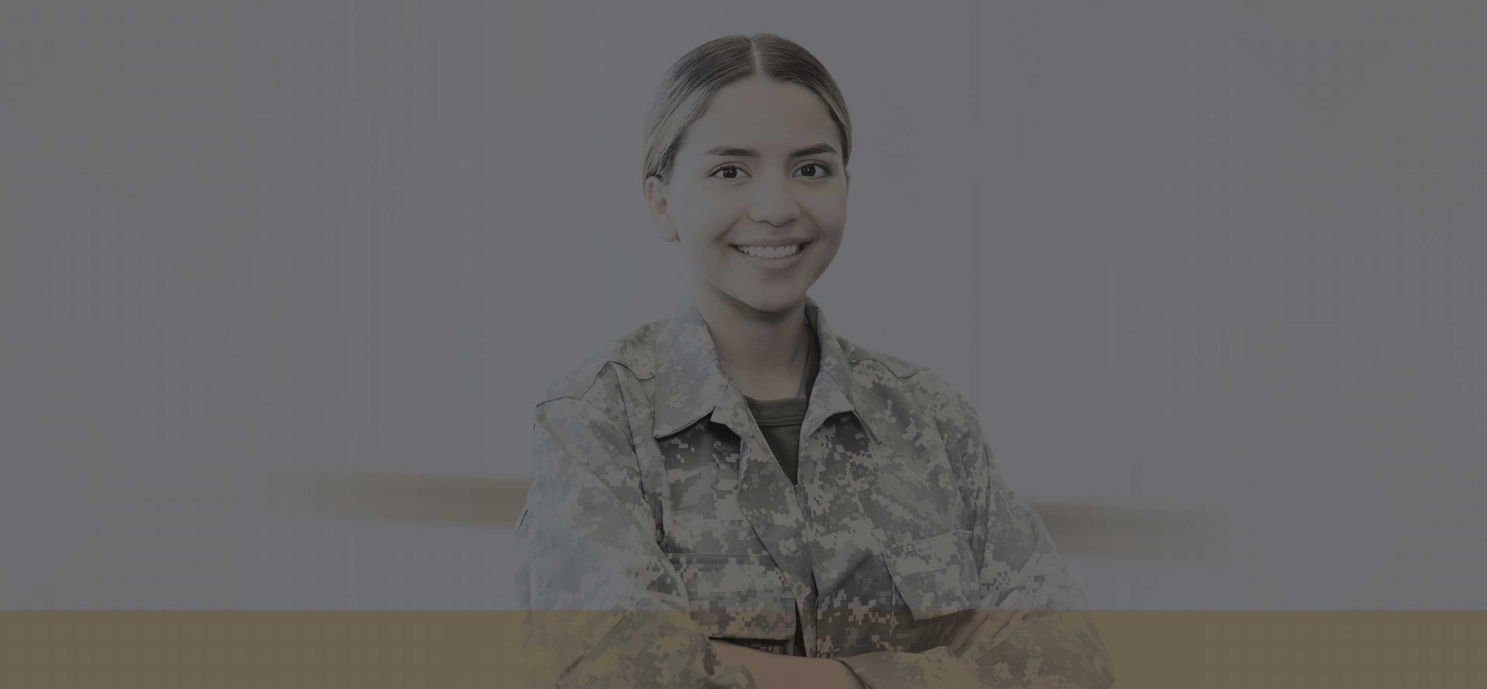Person in uniform looking at the camera smiling