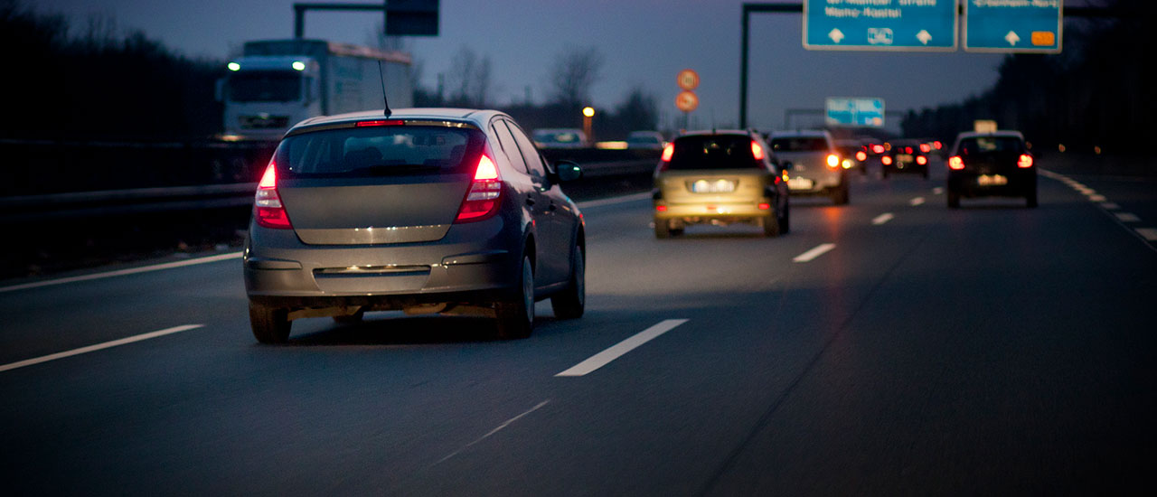 Cars driving on a highway.