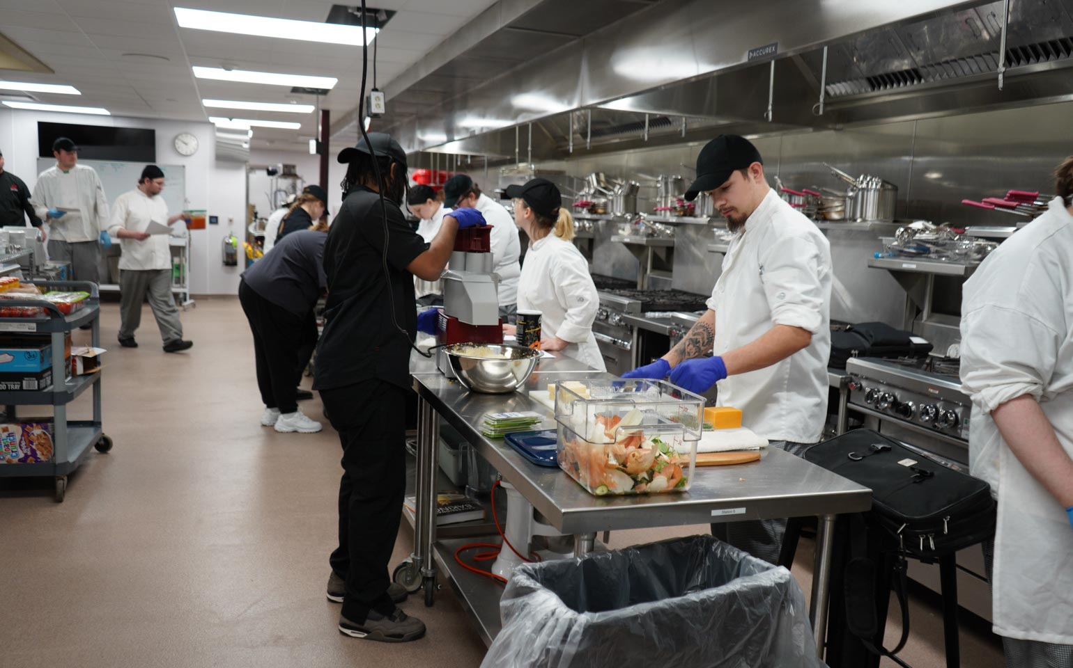 Culinary Arts students working in the kitchen lab.