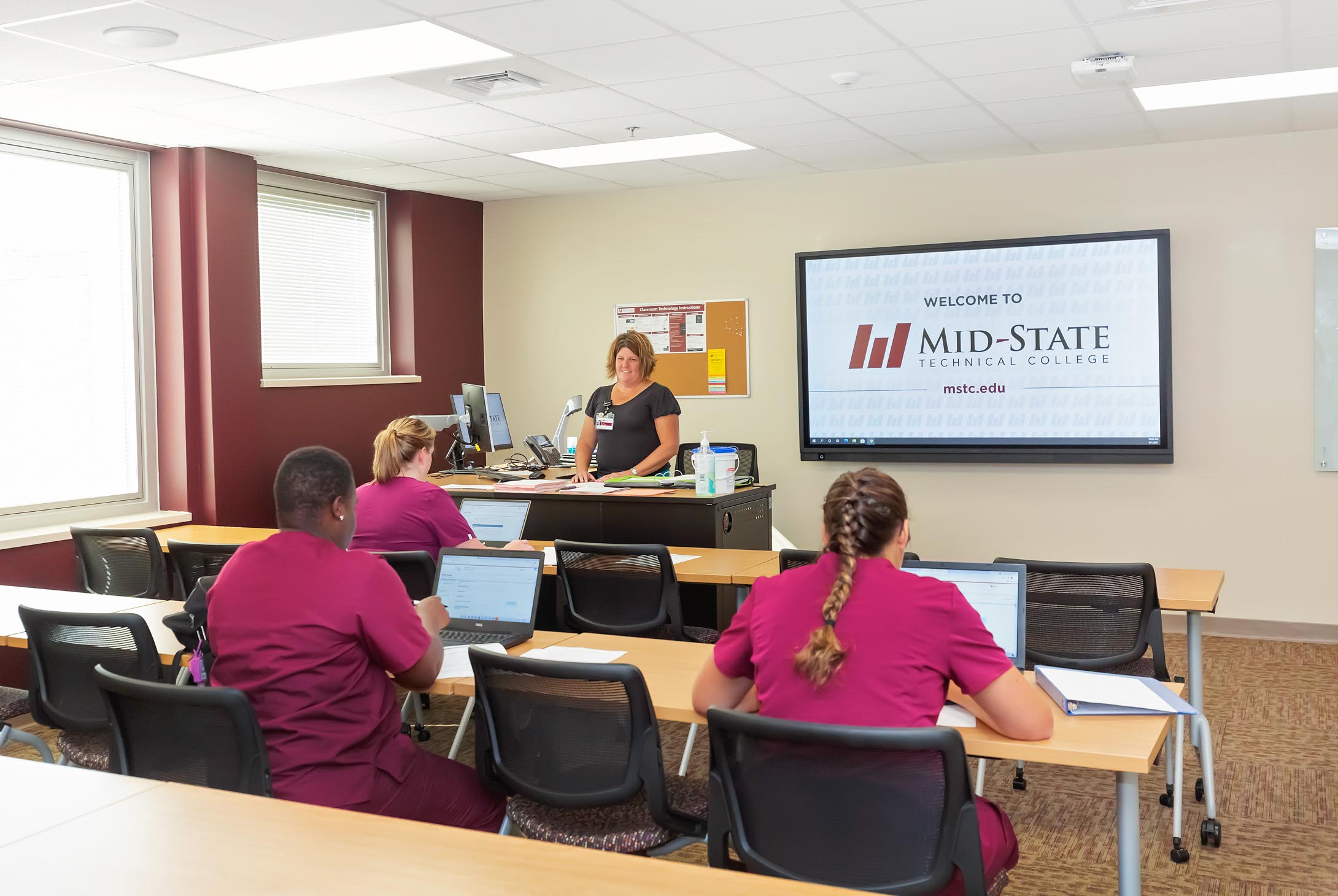 Healthcare Simulation Center classroom with students.