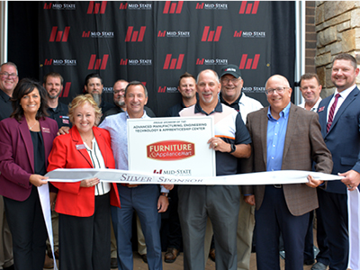 1.	Brothers Bill Fonti (president and CEO), Vince Fonti Jr. (chief procurement officer) and Joe Fonti (chief operations officer) of Furniture & Appliance Mart surrounded by Mid-State staff and leadership at the College’s milestone campaign celebration for the Advanced Manufacturing, Engineering Technology, and Apprenticeship Center held on the Stevens Point Campus, Sept. 17. Furniture & Appliance Mart’s donation pushed the campaign past the initial milestone $5 million milestone. Front row, from left: Dr. Bobbi Damrow, Mid-State VP of Workforce Development and Community Relations; Dr. Shelly Mondeik, Mid-State president; Bill, Vince, and Joe Fonti; Ryan Kawski, Mid-State Dean of Advanced Manufacturing & Engineering and Transportation, Agriculture, Natural Resources, & Construction. Back row, from left: Campaign co-chair Joe Kinsella; instructors Michael Johnson, Aaron Wulk, Michael Schultz and Matt McCall; campaign chair Wayne Bushman; and instructor Jim Koskey. 