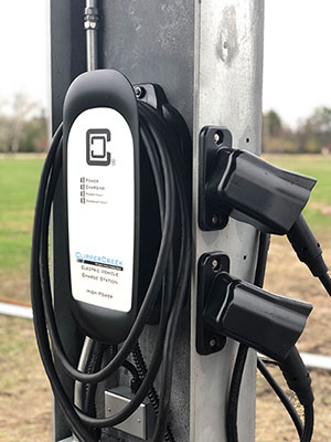 ClipperCreek Charger Provides 32 amps each if one vehicle is plugged in, 16 amps per vehicle if two vehicles are plugged in