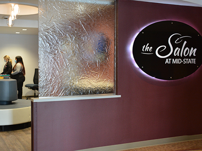 A new sign and entryway greet clients as they enter the remodeled Salon@Mid-State.