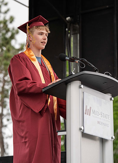 Student speaker and Diesel & Heavy Equipment Technician graduate Reid Tilberg delivers his address at Mid-State’s spring commencement on the Wisconsin Rapids Campus, May 17, 2025.
