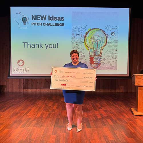 Sawyer Nelsen, Mid-State Technical College Digital Marketing student, receives second place and $500 for her business pitch at the NEW Ideas Pitch Challenge at Nicolet College on May 1, 2025.