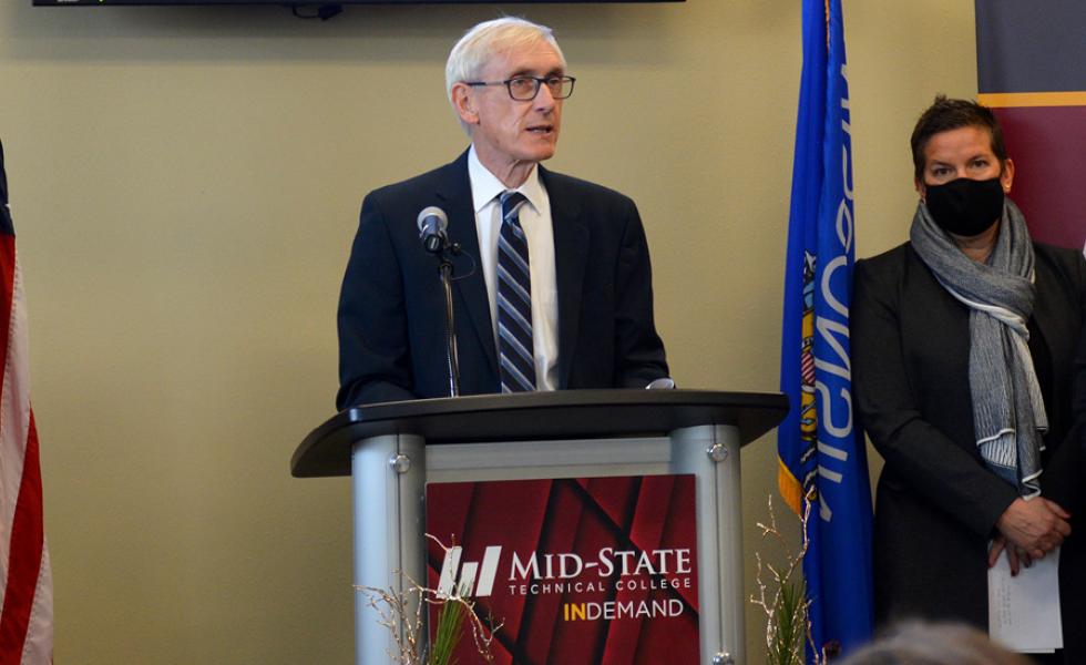 Governor Tony Evers addresses the audience at his press conference to announce Mid-State Technical College’s award of $9 million under the Workforce Innovation Grant program at the College’s Stevens Point Campus, Dec. 12. Also pictured, at right: Wisconsin Economic Development Corporation (WEDC) Secretary and CEO Missy Hughes and Department of Workforce Development (DWD) Secretary-designee Amy Pechacek.