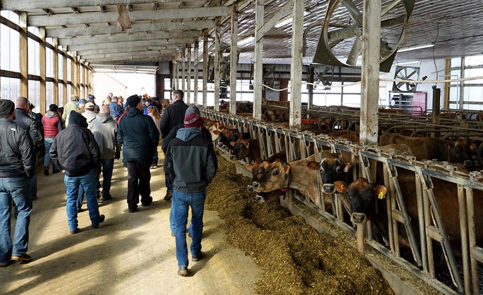 Farm Tour participants get a close look at economy-minded upgrades at Marshland Dairy in Spencer, Wis., on March 15, 2023.
