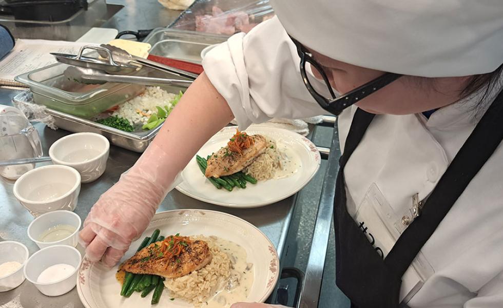 Gold medal winner Malia Xiong plates her main entrée during the Culinary Arts competition at the SkillsUSA State Leadership & Skills Conference. She will move on to represent Mid-State at the National Leadership & Skills Conference June 19-24 in Atlanta, Georgia.