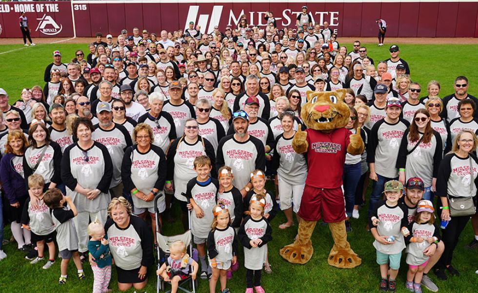 Mid-State Technical College faculty and staff along with their families at the annual company picnic at the Rafters game at Witter Field on Thursday, July 13.