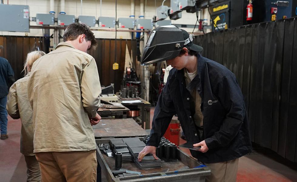 Local high school students prepare their materials for the SkillsUSA Welding Challenge at Mid-State Technical College’s Wisconsin Rapids Campus on Oct. 20.