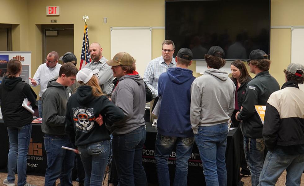 Youth Apprenticeship (YA) to Registered Apprenticeship (RA) Showcase attendees learn about apprenticeship opportunities at Ellis Construction and Pointe Precision, Inc. during the Nov. 2022 YA to RA Showcase Employer Fair on the Wisconsin Rapids Campus.