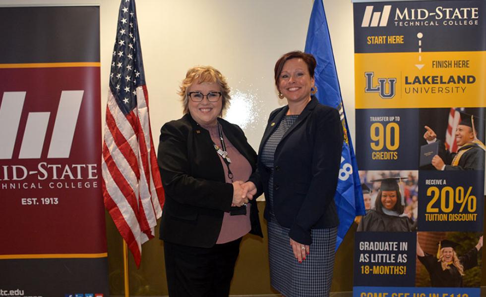 Mid-State Technical College President Dr. Shelly Mondeik (left) and Lakeland University President Dr. Beth Borgen (right) at the Mid-State and Lakeland expanded collaboration celebration event on Mid-State’s Marshfield Campus on Wednesday, Nov. 15.
