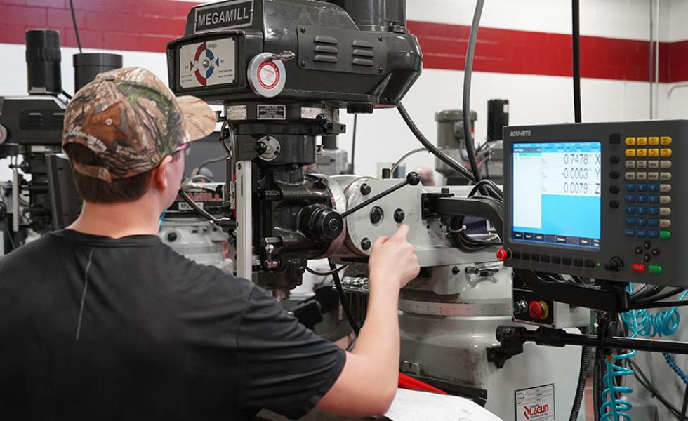 A local high school student participates in the Precision Machining event at the regional SkillsUSA® competition on Mid-State Technical College’s Wisconsin Rapids campus on Jan. 19.
