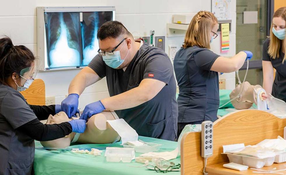 Respiratory Therapy students practicing their skills in class.