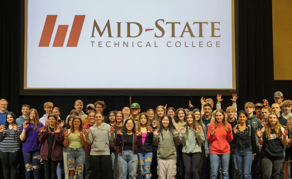 Admit Day attendees who have committed to attending Mid-State upon graduating from high school, on May 1 on the Wisconsin Rapids Campus with President Dr. Shelly Mondeik.