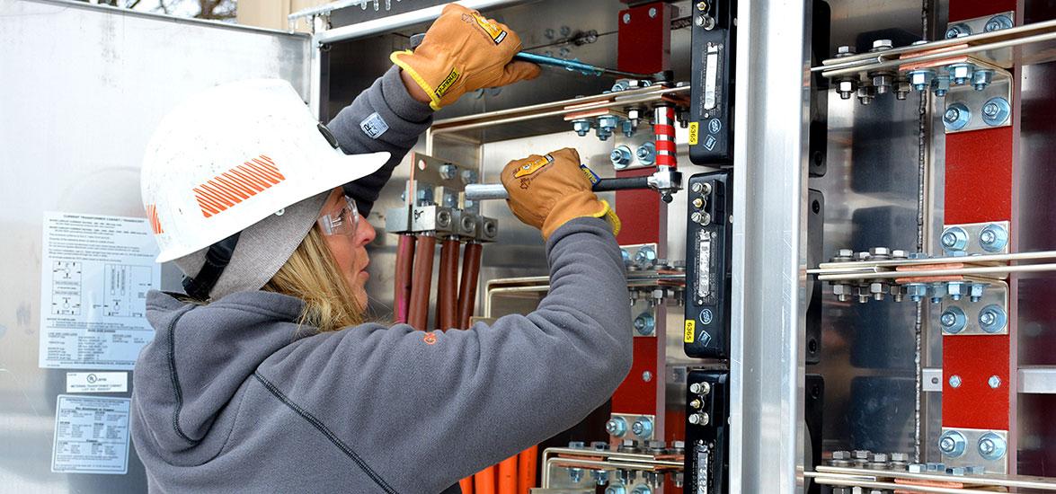 Candice Glowinski works on a meter while performing her duties as a meter servicer for We Energies. Glowinski earned her journeyworker status after completing Mid-State’s Metering Technician apprenticeship.