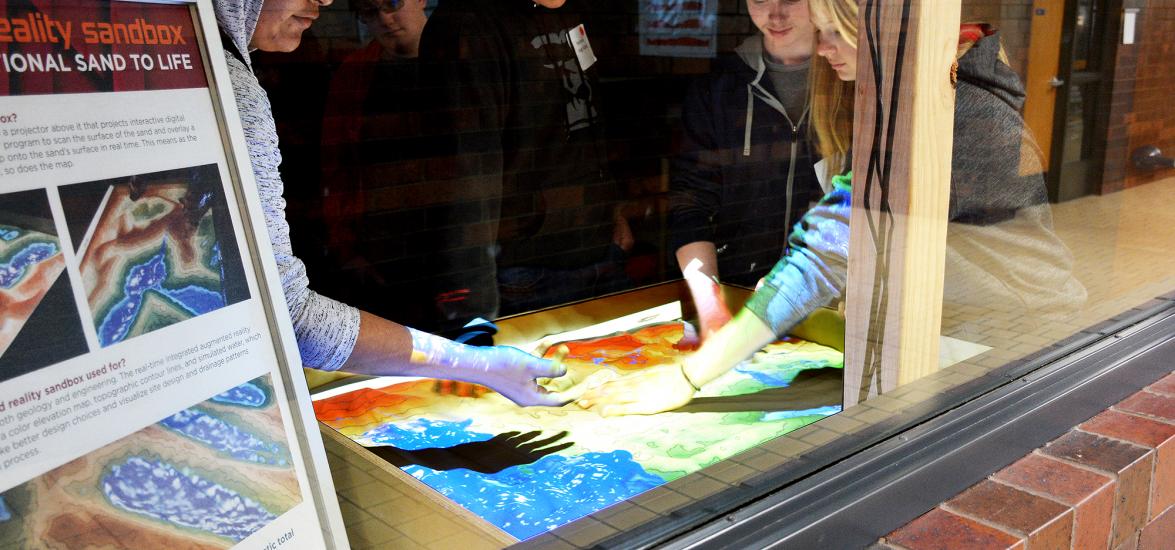 Visiting high school students interact with the augmented reality sandbox at Mid-State Technical College while exploring the Civil Engineering Technology-Highway Technician program at Engineering Day on the Wisconsin Rapids campus April 5. 