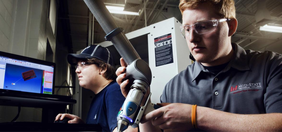 Mid-State Machine Tool Technician students practicing hands-on skills in the Computer Aided Machine Tool Programming course, one of the free offerings included in College’s summer Advanced Metal Mania program.