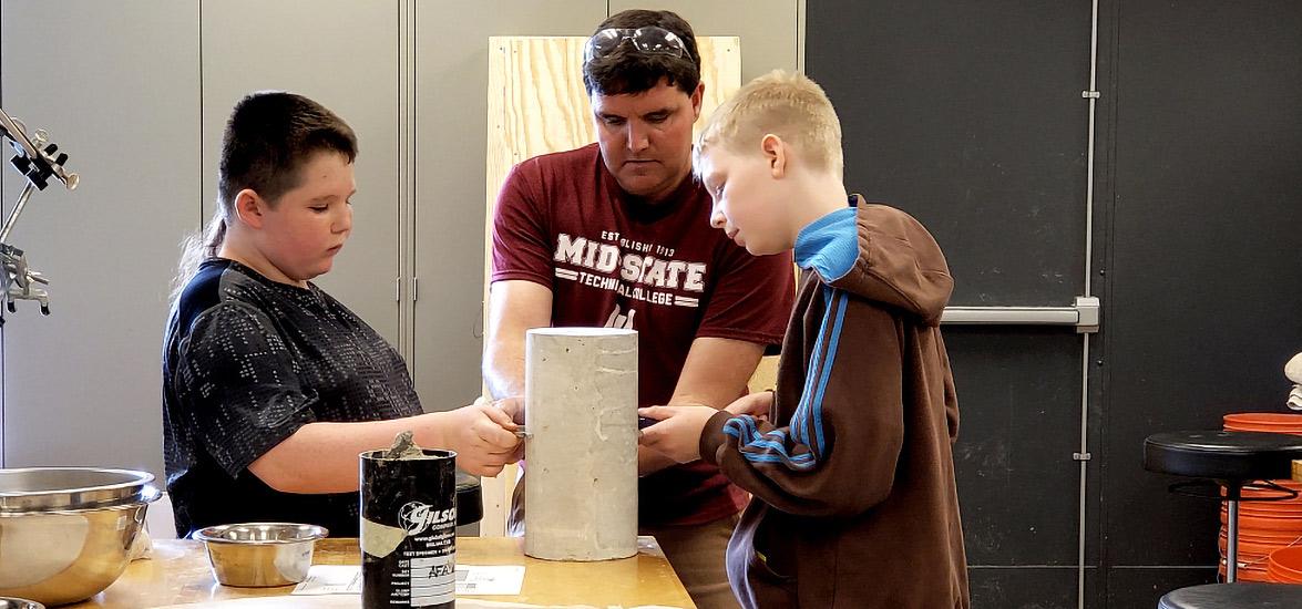 Students and instructor participating in Summer Manufacturing Camp