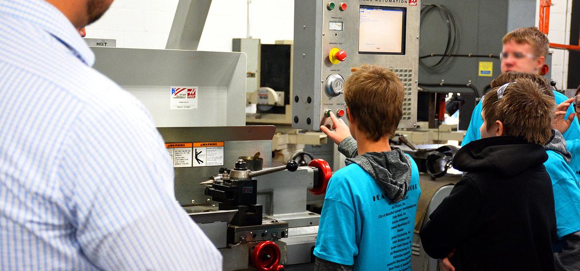 Local eighth-graders explore the Machine Tool Technician lab on the Wisconsin Rapids Campus of Mid-State Technical College during the Heavy Metal Tour, Oct. 2. 