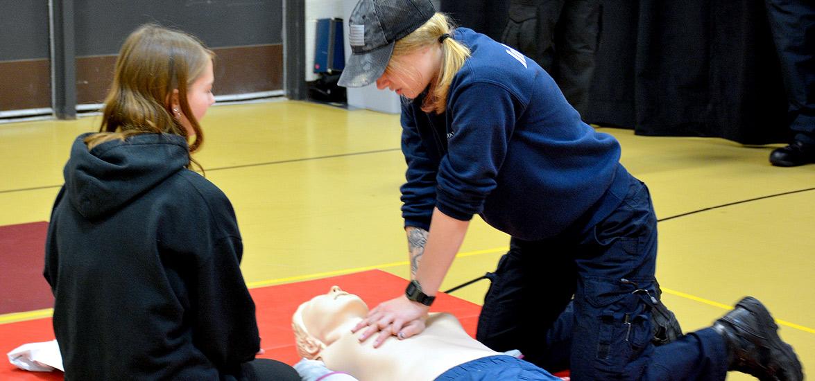 Mid-State Fire Protection Technician graduate and Paramedic Technician student Rachel Zorn demonstrates CPR for attending high school students at the Oct. 22 Program Showcase on Mid-State’s Wisconsin Rapids Campus.