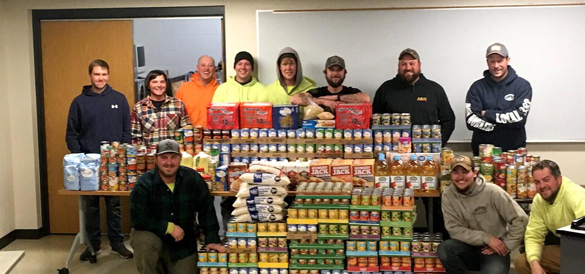 Mid-State’s Ironworker apprentices with the 1,624 pounds of food and household items they donated during the College’s annual Apprenticeship Food Drive. Over 7,000 pounds in total were donated by Mid-State apprentices.