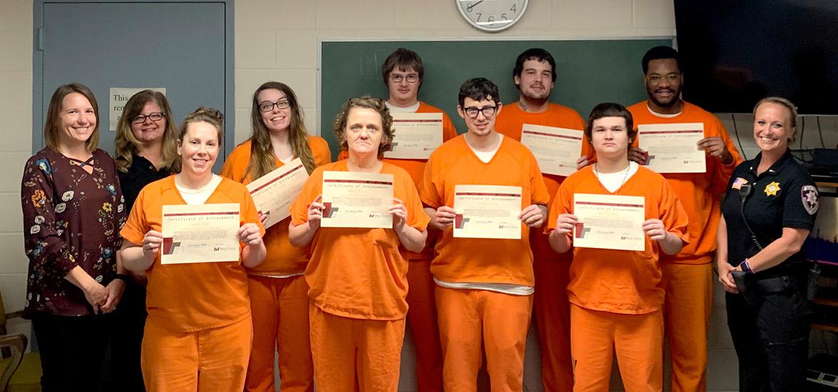 Pictured, from left: Mid-State Dean of Basic Education & Learning Resources Amber Stancher and Instructor Trish Zdroik, Jamie Rezin, Ashley Stone, Gerri Klein, Allen Rice, Corday Alarie, Cody Schladweiler, Dakota Gecht, Daniel Rogers and Wood County Jail Lt. Melissa Saeger.