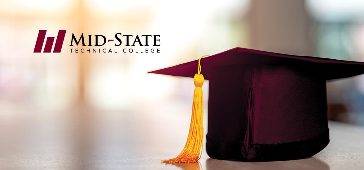 Graduation cap sitting on a table. Mid-State logo appearing next to it.