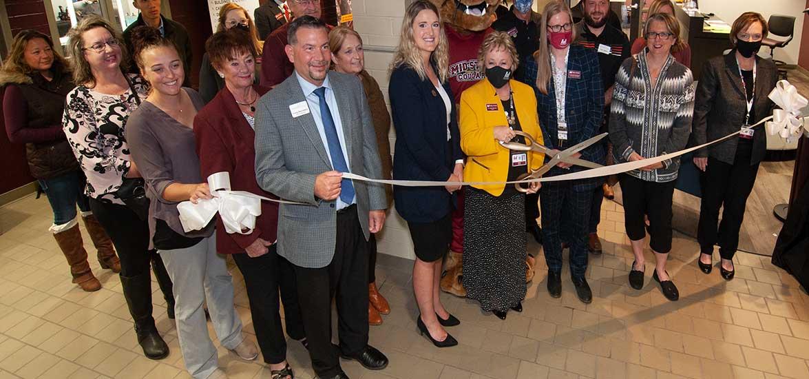 Mid-State Technical College staff joined by Heart of Wisconsin Chamber of Commerce representatives at the College’s formal ribbon cutting for the remodeled Salon at Mid-State, Oct. 11. Front row, from left: Craig Bernstein, Mid-State Director of Workforce & Professional Development, Angel Whitehead HOW Chamber of Commerce President; Dr. Shelly Mondeik, Mid-State President; Dr. Missy Skurzewski-Servant, Mid-State Dean of Business & Technology; Carrie Nikolai, HOW Chamber of Commerce Ambassador; and Dr. Deb