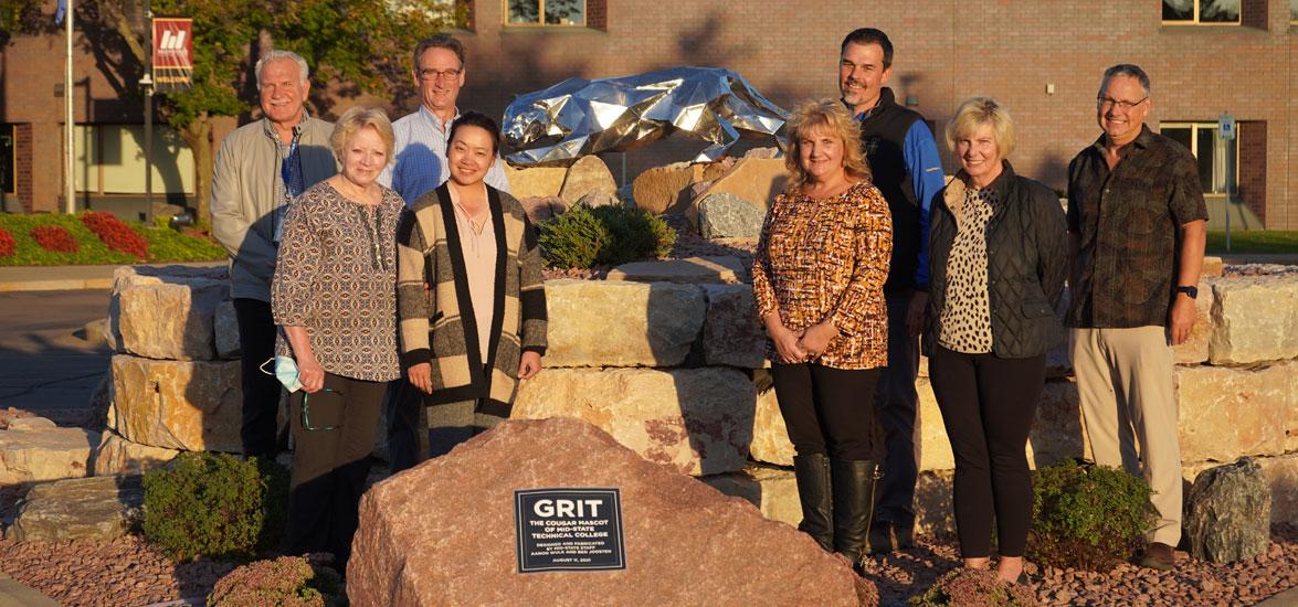 Mid-State Technical College Board members with the recently installed cougar mascot sculpture on the Wisconsin Rapids Campus. From left: Craig Gerlach, Betty Bruski Mallek, Charles Spargo, Are Vang, Kristin Crass, Scott Groholski, Lynneia Miller and Richard Merdan.