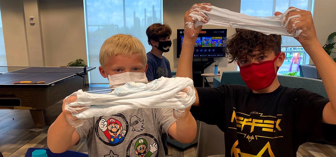 College Camp participants create fluffy slime, an activity in the Playing with Polymer session during the summer 2021 event. This year’s College Camp offers 12 activities for campers to choose from when they register.