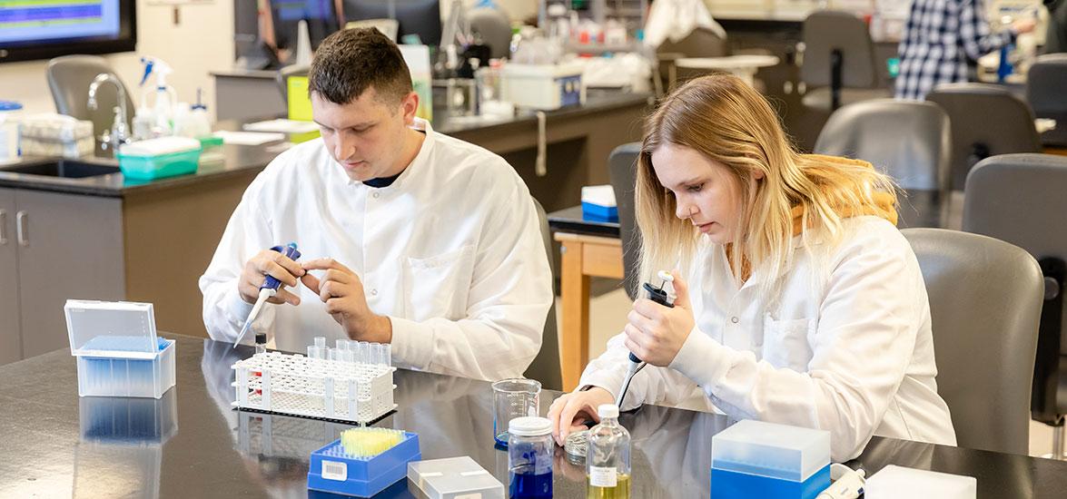 Mid-State students in a microbiology class practice their pipetting skills. The class is a requirement in Mid-State’s Liberal Arts-Associate of Science program, one of two Mid-State University Transfer programs that now give graduates the option of continuing their education at 11 different four-year colleges with seamless transfer.