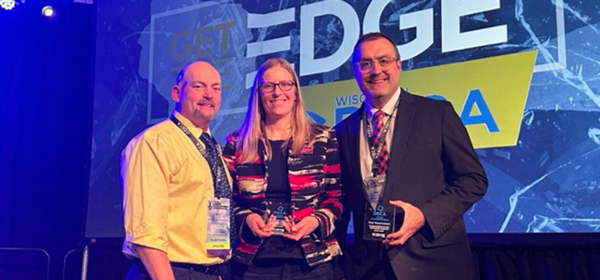 Missy Skurzewski-Servant accepts the Friend of Wisconsin DECA Award, Feb. 28. From left: Eric Siler, Wisconsin Rapids Public Schools career & technical education coordinator and DECA District 2 co-chair, Missy Skurzewski-Servant, Mid-State dean, Business & Information Technology and Ron Rasmussen, Wisconsin Rapids Lincoln High School principal.