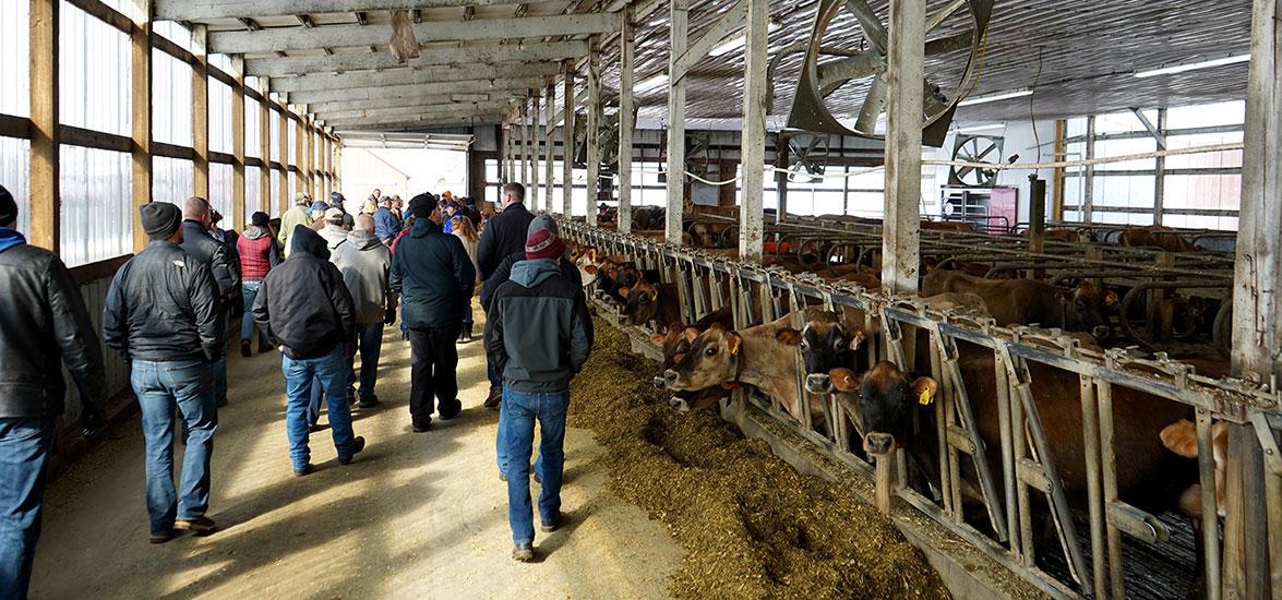 Farm Tour participants get a close look at economy-minded upgrades at Marshland Dairy in Spencer, Wis., on March 15, 2023.