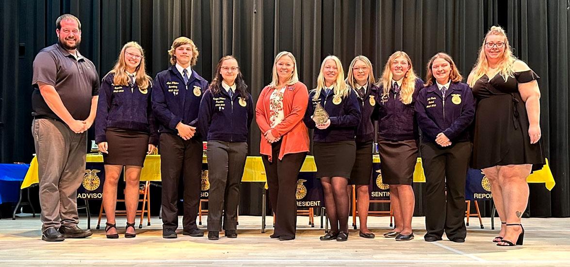 Dr. Alex Lendved (center), Mid-State Technical College dean of the Marshfield Campus and agriculture programs, presents the Chapter of Excellence Award to the Stanley-Boyd FFA chapter at Stanley-Boyd High School’s annual FFA Awards Banquet, May 6.