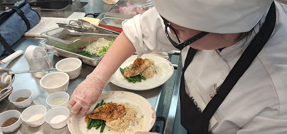 Gold medal winner Malia Xiong plates her main entrée during the Culinary Arts competition at the SkillsUSA State Leadership & Skills Conference. She will move on to represent Mid-State at the National Leadership & Skills Conference June 19-24 in Atlanta, Georgia.