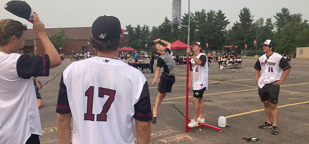 • Dominic Schoenick of Grand Rapids competes in the challenge to jump as high as a Rafter at the “Rafters Meet-and-Greet” and “Cuts 4 Kids” event held on Mid-State’s Wisconsin Rapids Campus, June 14.