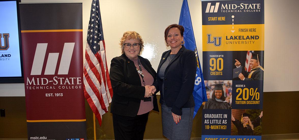 Mid-State Technical College President Dr. Shelly Mondeik (left) and Lakeland University President Dr. Beth Borgen (right) at the Mid-State and Lakeland expanded collaboration celebration event on Mid-State’s Marshfield Campus on Wednesday, Nov. 15.